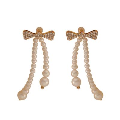 China Vintage Highlighted Colorful Pearl Bow Beaded Earrings with Feminine Style Long 925 Silver Needle Earrings for sale