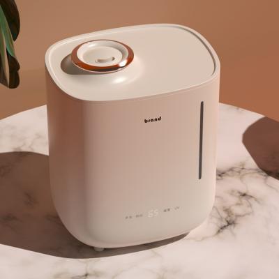 China 2021new Hotel Product PTC Heating Warm Mist Humidifier Top Filling Steam Humidifier for sale