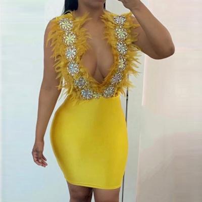 China Sexy Sleeveless Yellow Elegant V-Neck Bodycon Anti-Static Ladies Feather Bandage Dress Womens Clothing Club Dress Luxury Beading Dresses for sale