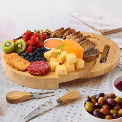 China Sustainable Amazon Sells Family Party Circular Wood Cutting Board Cutting Plate Bamboo Cheese Board for sale