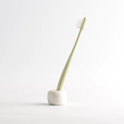 China Sustainable Modern Design 1 Hole Cheap Ceramic Toothbrush Holder for sale