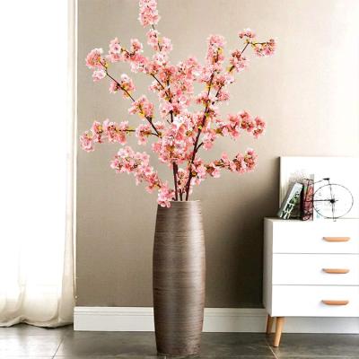 China Waterproof Artificial Flower Vase Wedding Spring Home Fake Peach Long Stems Tree Decor Silk Plastic Cherry Blossom Branches for sale