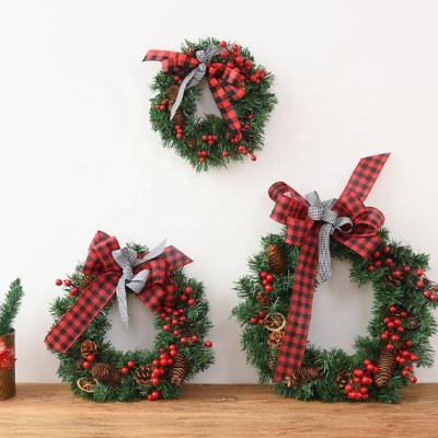 China Hot Red Bow Wreath Christmas Chirstmas Decor Promotion Decor Pine Cone Christmas Indoor Decorations for sale