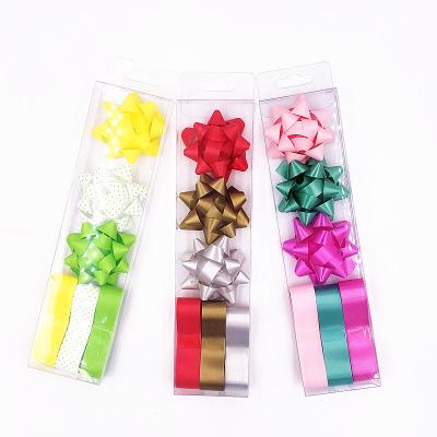 China Gift Wrap Bow Holiday Supplies PP Star Flower Color Strip Box Gift Wrapping Star Flower For Party Decoration Ribbon Christmas for sale