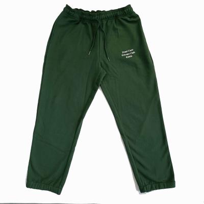 China Anti-wrinkle silk screen printing sports pants good quality perfect nylon green sweat men for sale