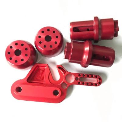 China Custom Machining Auto /medical/agricultural/train/valve/textile Decoration CNC Machining Parts CNC Machining Red Anodized Aluminum CNC Machining Parts for sale