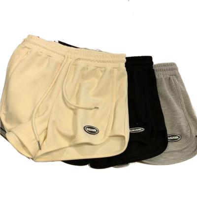 China 2022 new QUICK DRY shorts for girls summer loose and thin Korean version of hot pants of the same wid men's and women's style sports pants casual for sale