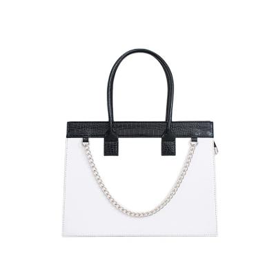 China 2022 fashion women handbags high capacity black and white ladies side long handbag for sale