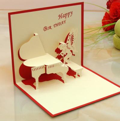 China Africa Piano Angel Happy Birthday Handmade Greeting Card Gift Custom Printing Pop Up 3D Birthday Greeting Card for sale