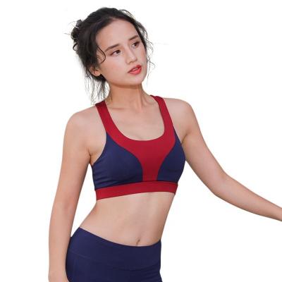 China Breathable ladies BH sosten polyester spandex sports bra compression gym bra women racerback sports bras for sale