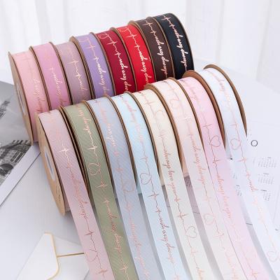 China Heart Ribbon Flower Wrapping Paper Grosgrain Ribbon Cake Ribbon Sustainable Tanning Baking Wholesale for sale