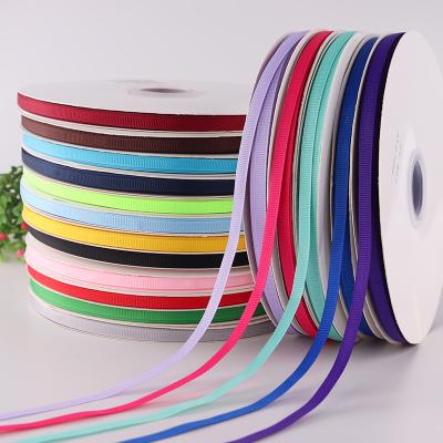 China Solid Color Viable Gift Wrapping Ribbon Spot 0.6cm Satin Ribbon Flower Packaging 100 Yards 1 Roll Black Satin Ribbon for sale