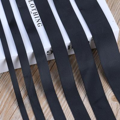 China Durable Solid Color Polyester Ribbon Stain Garment Accessories Ribbon Ribbed Black Plain Colored Ribbon for sale