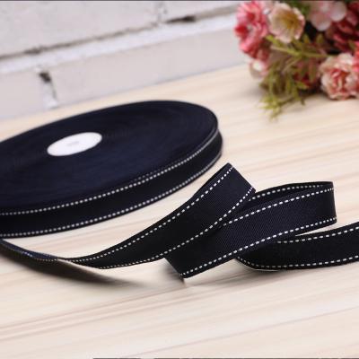 China Viable Manufacturers Supply Ribbed Black White Polka Dot Ribbon Lanyard Large Roll Texture Ribbon Satin Home Dyed for sale