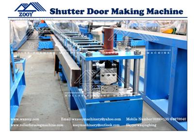 China Roller Shutter Door Roll Forming Machine 0.6-1.2MM Thickness for sale