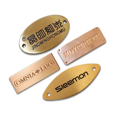 China Bikini Alloy Logo Brand Shape Custom Logo Swimwear Gold Metal Customized Label For Sewing C001 for sale