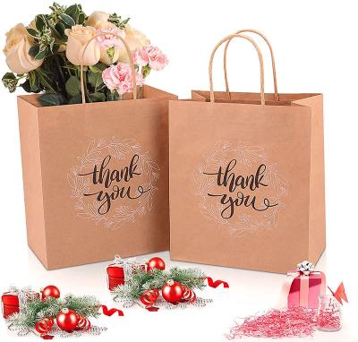 China Recycled Materials Plain With Custom Drawstring Handles Factory Price Kraft Paper Bag Luxury Paper Bags With Logo for sale