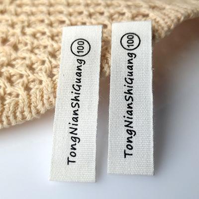 China Washable Custom Logo Low Price Cotton Fabric Label Iron On Clothing Label Sticker Satin Labels For Baby Clothes for sale