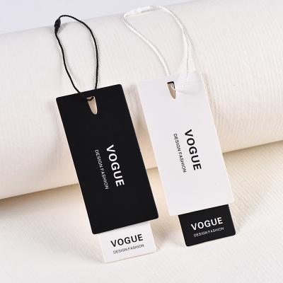 China Sustainable Custom Luxury Hangtags For Apparel Own Logo Garment Thick White Cardstock Printing Foil String Tag for sale