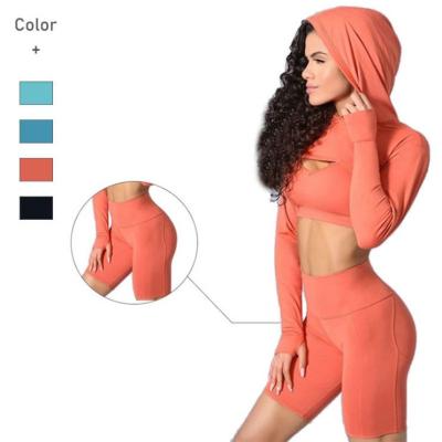 China Breathable Long Sleeve Hooded 3 Piece Yoga Suit With Fitness Solid Color Sports Bra And Waistless Short Shorts Suit for sale