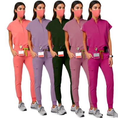 China Eco-Friendly Stock Scrubs Sets New Style Hospital Uniforms Wholesale Jogger Healthy Nurse Uniform Medical Scrubs Tops And Pants for sale