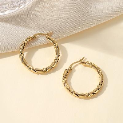 China Fast Delivery Xinting Jewelry Twist Huggies Gold Thin Circle Chunky Statement Earrings For Women for sale