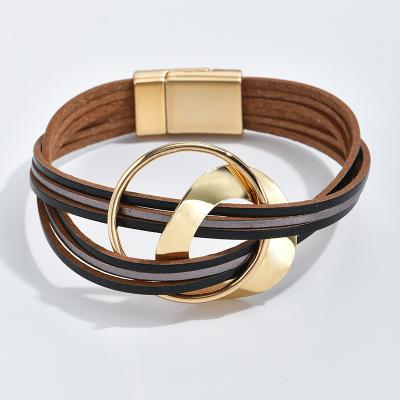 China Double-ring Design Hollowed Out Sense Cross Gold Circle Friendship Buckle Genuine Leather Magnetic Bracelet For Men for sale