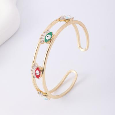 China Simple hollow three-color eye bangle fashion gold opening copper plated bangle evil spirit environmental friendly for jewelry making charms for sale