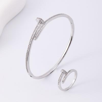 China 2023 High Quality Designer's Nail Bangle Clip Style Full Diamond Unisex Colorless Bracelet For Custom Customization for sale