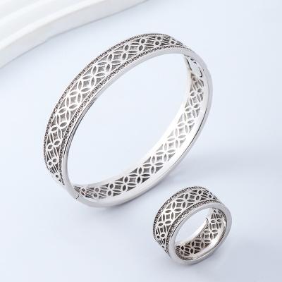 China Jewelry Jewerly Set Cut Out Copper Coin Hollow Bracelet Grass Leaf Series Four Lace Fashion Retro Bracelet Ring Set for sale