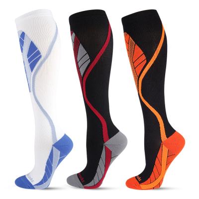 China Colorful Breathable Sports Socks Athletic Cotton Absorbent Anti Slip Long Football Socks for sale