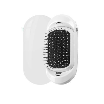 China Home Scalp Massage Comb Anti Frizz Ionic Hair Sweep Electric Negative Ions Hair Sweep Comb Portable Sleek Hair Magic Combs for sale