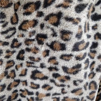 China Super Soft Leopard Print Faux Rabbit Fur Fabric For Women Coat Blankets for sale