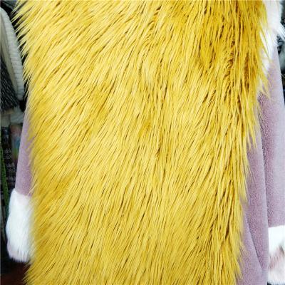 China Smoothful Long Yellow Color Pile Plush Shaggy Faux Fur Fabric For Coat Carpet Blanket for sale