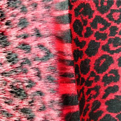 China Leopard Red Color Leopard Jacquard Fur Fabric Faux Imitation Animal Fur For Coat for sale