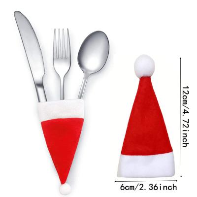 China Home Festival Decoration Mini Christmas Santa Hats Silverware Holder Tableware Holder Knife Fork Pocket Cutlery Storage for sale