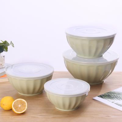 China Universal Plastic Freshness Storage Bowls With Lid 4pcs Food Containers Fruit Salad Bowl Set With Cover for sale