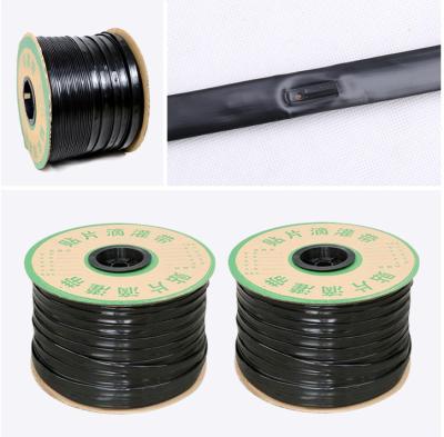 China Plastic Customized Size Spacing Water Saving Agriculture Irrigation Drip Tape With Inner Flat Emitter for sale