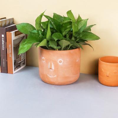 China Wholesale New Design Breathable Mini Face Decorative Succulent Planter Bonsai Pots Terracotta Pots for sale