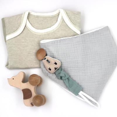 China Hot Sales 100% Cotton Newborn Baby Gift Set Wooden Dog Toy Moon Teether Pacifier Chain Romper Jumpsuit for sale