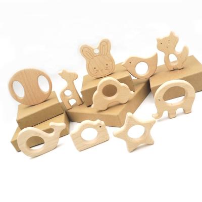 China Toy Natural Unfinished Wooden Rattles Soft Beech Baby Teether Fun Toy Animal Milk Teeth Rattle Toys for sale