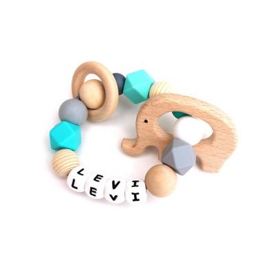 China Soft Toy Customized Baby Name Silicone Beads and Wooden Teether Toy Baby Nurturing Rattle for sale