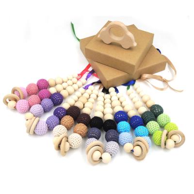 China Soft Toy Dropshipping Food Grade Natural Round Wooden Beads And Handmade Crochet Beads Baby Teether Teething Necklace for sale