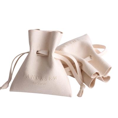 China Hot Sale Recyclable Custom Embossed Microfiber Jewelry Gift Bag Drawstring Leather Hot Stamping Jewelry Bag for sale