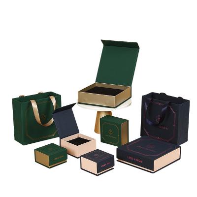 China Simple and Elegant Custom Jewelry Box Personalized Logo Magnetic Slip Flip Jewelry Packaging Box Five Piece Set Earring Jewelry Box for sale