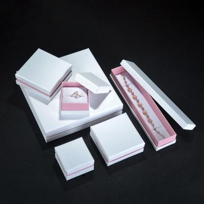 China Jewelery packaging wholesale tiandi cover high end jewelry box pink paper ring box customized for sale