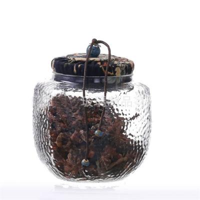 China Heatable Multifunctional Japanese Food Tea Nut Storage Glass Jar With Cloth Cover for sale