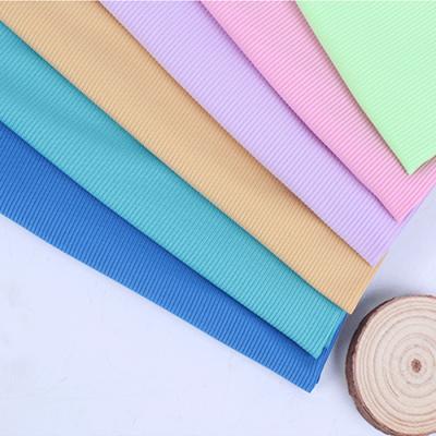 China Anti Pill In The Running Polyester Spandex Fabric Cool Feeling 2*2 Rib Knit Fabric For Sweater Dress for sale