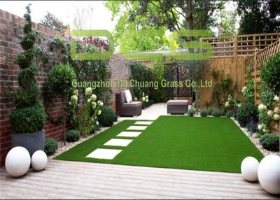 China 12000 Dtex Strong Pile Artificial Grass Garden For Home And Public Place for sale