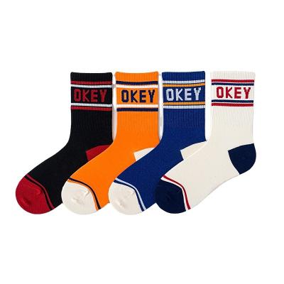 China Fashion Breathable Letter Knocks Cotton Crew Sport Knocks Comfortable Alphabet Ok Socks for sale